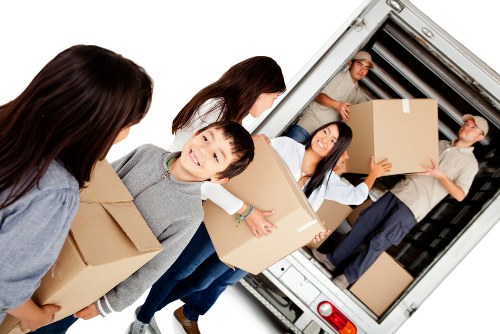 Sturdy packing boxes and wrapping materials prepared for a local move in Sutton