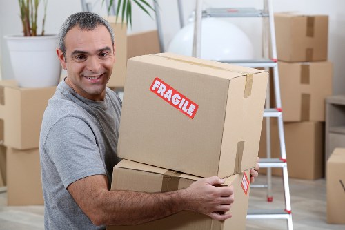 Removal van team preparing safely for a move