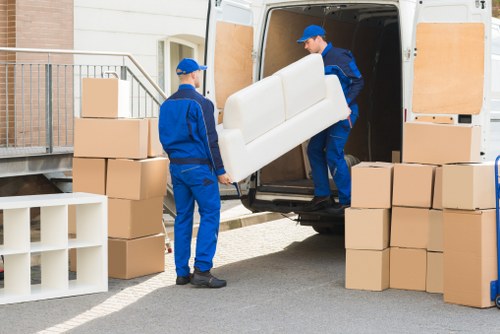 Boxed belongings and protective packing supplies for moves and storage in Sutton