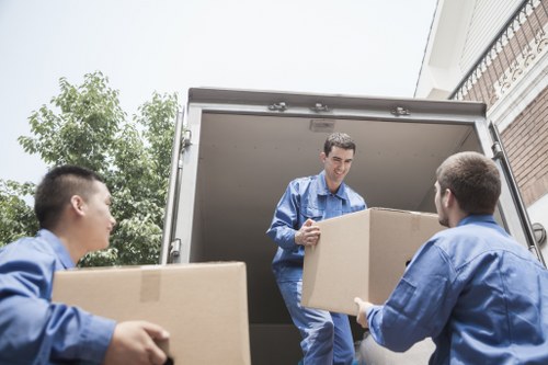 Packed boxes and household items ready for moving day in Sutton