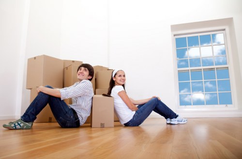 Local moving team handling furniture loading in Sutton