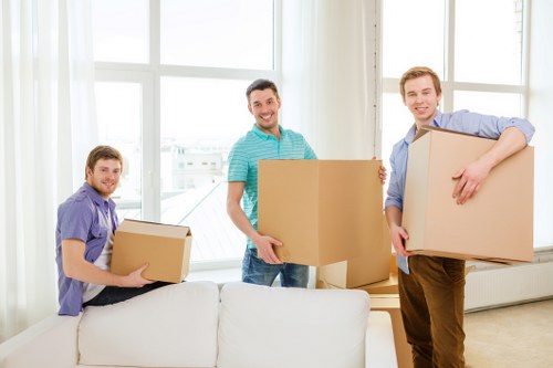 Moving truck loading furniture and boxes for a Sutton relocation