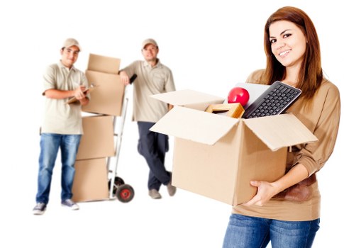 Packed moving boxes and furniture ready for urgent collection