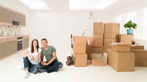 Professional movers handling stairs and access in Sutton