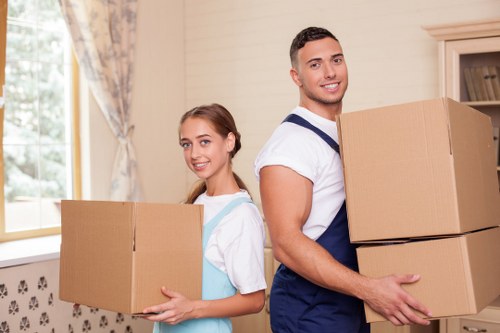 Packed boxes and furniture inside a Sutton removal van
