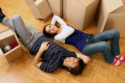 Moving team confirming booking details and access information