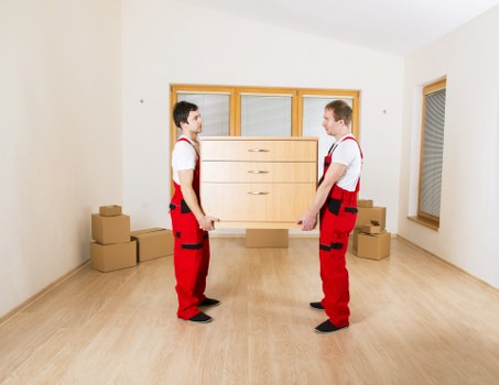Careful loading of household items during a Sutton house removal